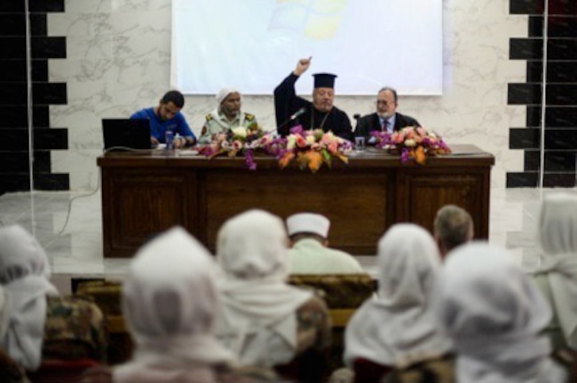 Imam Hamdi Murad (far right) and Father Nabil Haddad (center-right) talked to U.S. military chaplains and JAF Imams about how they work together as a team to counter extremism and promote unity within Jordan through word and deed at Prince Hassan College April 16. Imam Murad is one of the most well respected Imams within the Hashemite Kingdom of Jordan and a leading figure in Islamic thought amongst Muslims throughout the Middle East. The Very Reverend Father Haddad is a priest in the Melkite Greek Catholic Church and a leading figure among Arab Christians in Jordan. The two religious leaders served as role players for a key leader engagement scenario during Eager Lion 2018.