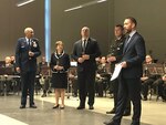 Maj. Gen. Leonard Isabelle, Michigan Air National Guard commander, U.S. Ambassador to Latvia Nancy Pettit, Latvia's Minister of Defense, Raimonds Bergmanis, Lt. Gen. Leonids Kalniņš, Latvia's National Armed Forces commander, and event moderator Kaspars Galkins, prepare to toast the 25th Anniversary of the Latvia-Michigan partnership during a special ceremony, April 27, 2018 in Riga, Latvia.