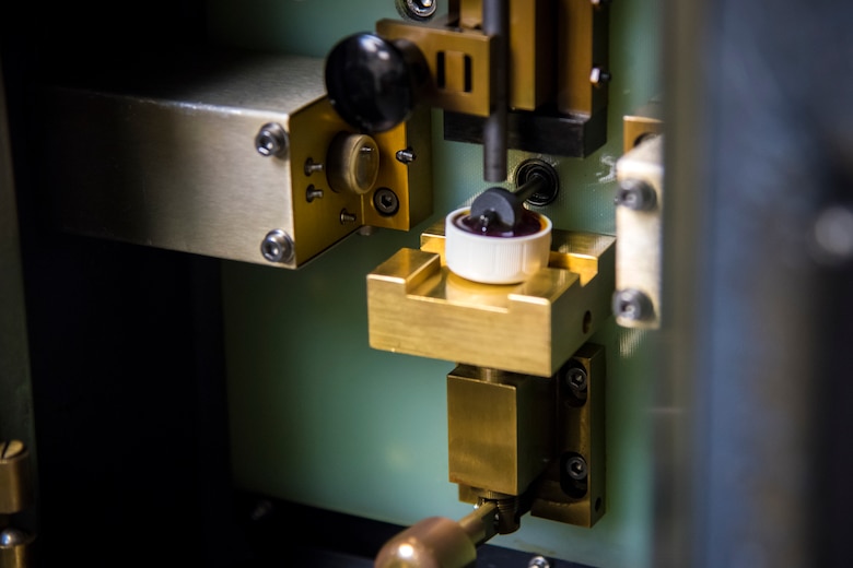 An oil sample rests on a panel prior to analysis, May 2, 2018, at Moody Air Force Base, Ga. Non-Destructive Inspection technicians use various methods to complete these inspections such as X-ray, florescent dye penetrant, oil analysis and ultrasonic scanning to examine and inspect numerous aircraft parts and components to ensure that they are in usable condition. (U.S. Air Force photo by Airman 1st Class Eugene Oliver)