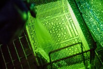 Senior Airman Matthew Horne, 23d Maintenance Squadron non-destructive inspection (NDI) specialist, rinses off an aircraft part, May 2, 2018, at Moody Air Force Base, Ga. NDI technicians use various methods to complete these inspections such as X-ray, florescent dye penetrant, oil analysis and ultrasonic scanning to examine and inspect numerous aircraft parts and components to ensure that they are in usable condition. NDI technicians use various methods to complete these inspections such as X-ray, florescent dye penetrant, oil analysis and ultrasonic scanning to examine and inspect numerous aircraft parts and components to ensure that they are in usable condition. (U.S. Air Force photo by Airman 1st Class Eugene Oliver)