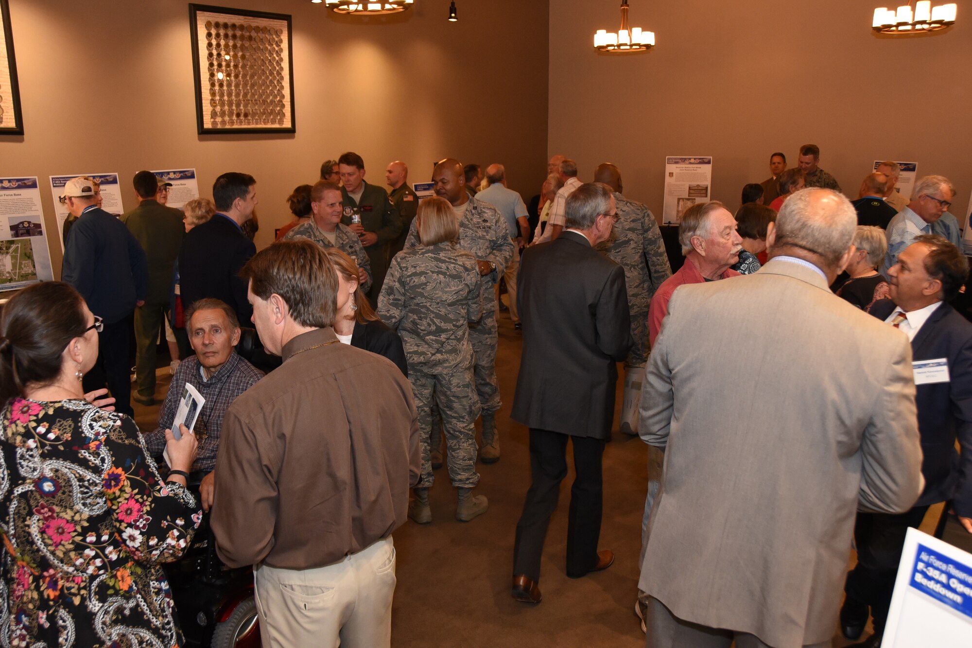 Service members from Naval Air Station Fort Worth Joint Reserve Base, Texas meet with local residents and elected officials at the F-35A Environmental Impact Statement Public Scoping Meeting April 19, 2018, in Fort Worth, Texas. The meeting solicited comments from the community about the F-35A aircraft bed down that would replace the current F-16 mission. The community can still give comments at http://www.afrc-f35a-beddown.com until May 11, 2018. (U.S. Air Force photo by Tech. Sgt. Charles Taylor)