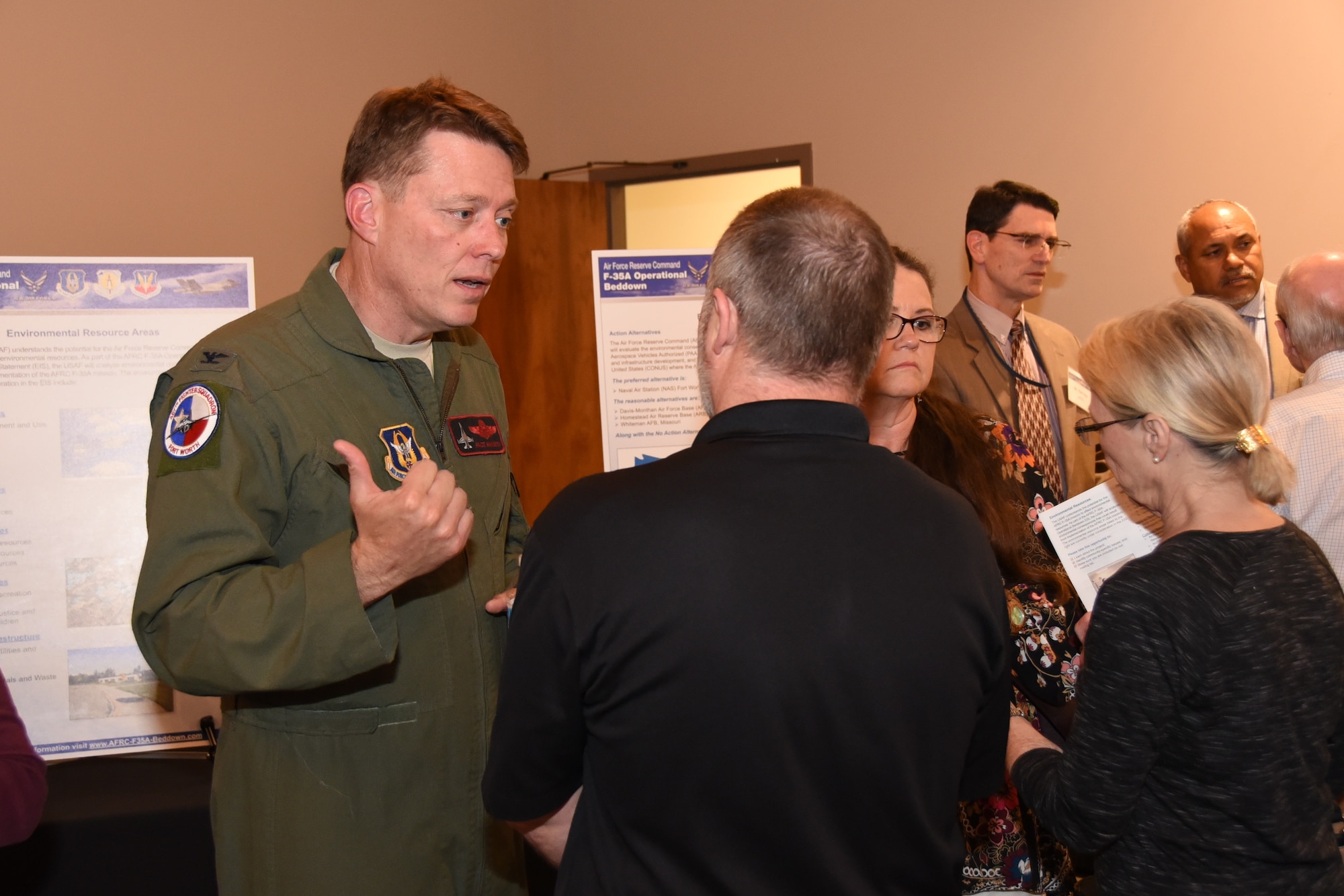 Col. Mitchell Hanson, 301st Fighter Wing Vice Commander at Naval Air Station Fort Worth Joint Reserve Base, Texas, meets with local residents and elected officials at the F-35A Environmental Impact Statement (EIS) Public Scoping Meeting April 19, 2018, in Fort Worth, Texas. The meeting solicited comments from the community about the F-35A aircraft bed down that would replace the current F-16 mission. The community can still give comments at http://www.afrc-f35a-beddown.com until May 11, 2018. (U.S. Air Force photos by Tech. Sgt. Charles Taylor)