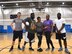 Master Sgt. Dawn Williams, 932nd Health Professions Recruiter, in purple shirt, gathers part of her team during a break in the volleyball action on April 26, 2018, at Scott Air Force Base, Ill.  The teams usually play competitive games on Tuesdays and Thursdays against other government agencies on base.  Williams recruits new medically-trained civilians into the Air Force Reserve by day, and also coaches the 932nd Airlift Wing's volunteer volleyball team by night.  Those interested in either joining the 932nd Airlift Wing as new Airmen, or those already in the wing looking to join the volleyball action can contact her at 618-229-7077.  (U.S. Air Force photo by Lt. Col. Stan Paregien)