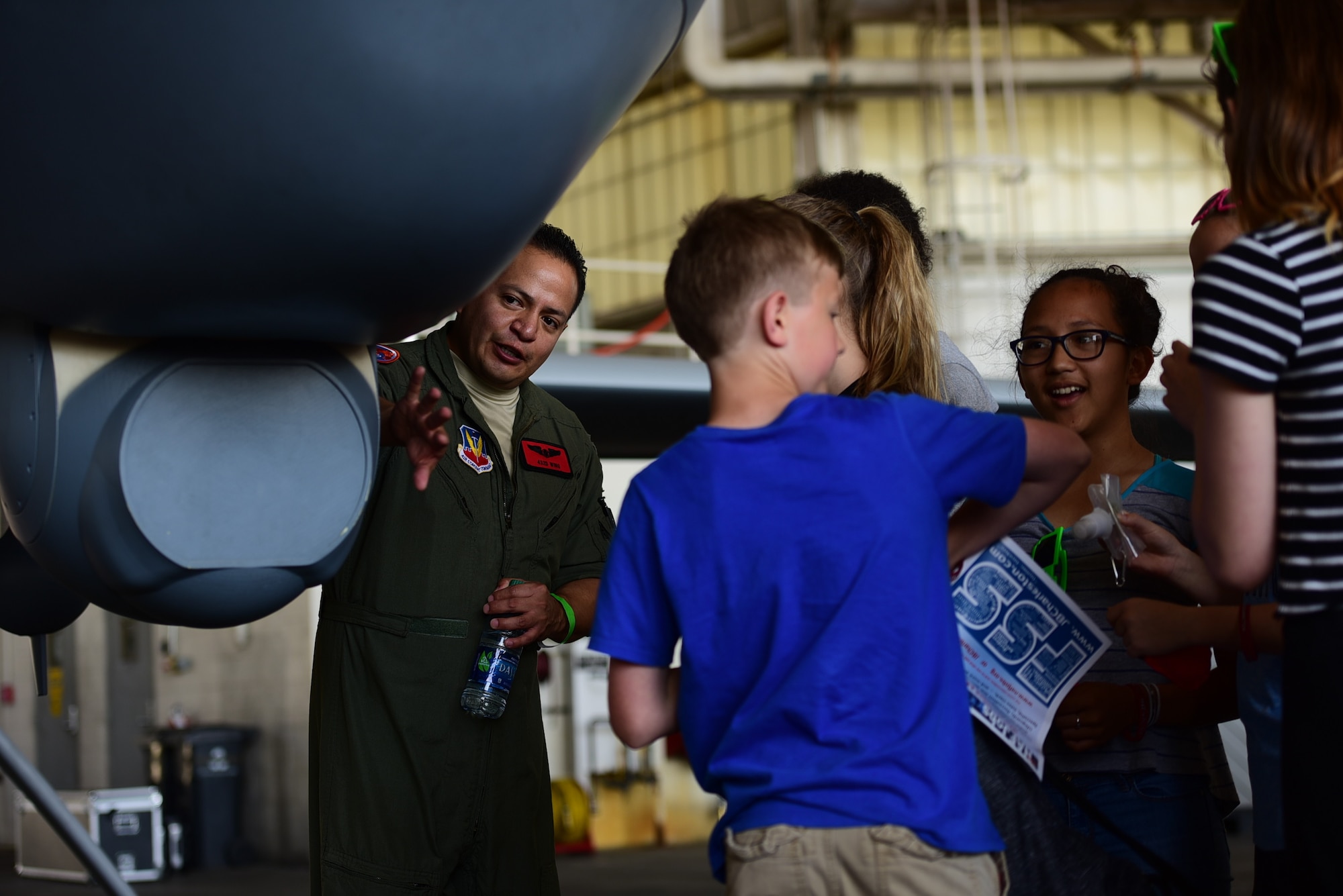Tech. Sgt. Daniel, 489th Attack Squadron sensor operator, explains the capabilities of the Multi-Spectral Targeting System of an MQ-9 Reaper to spectators April 27, 2018, at the Joint Base Charleston Air & Space Expo at JB Charleston, S.C. More than 80,000 spectators were able to learn about the MQ-9 and how the Airmen who fly and maintain it deliver persistent attack and reconnaissance capabilities. (U.S. Air Force photo by Senior Airman Christian Clausen)
