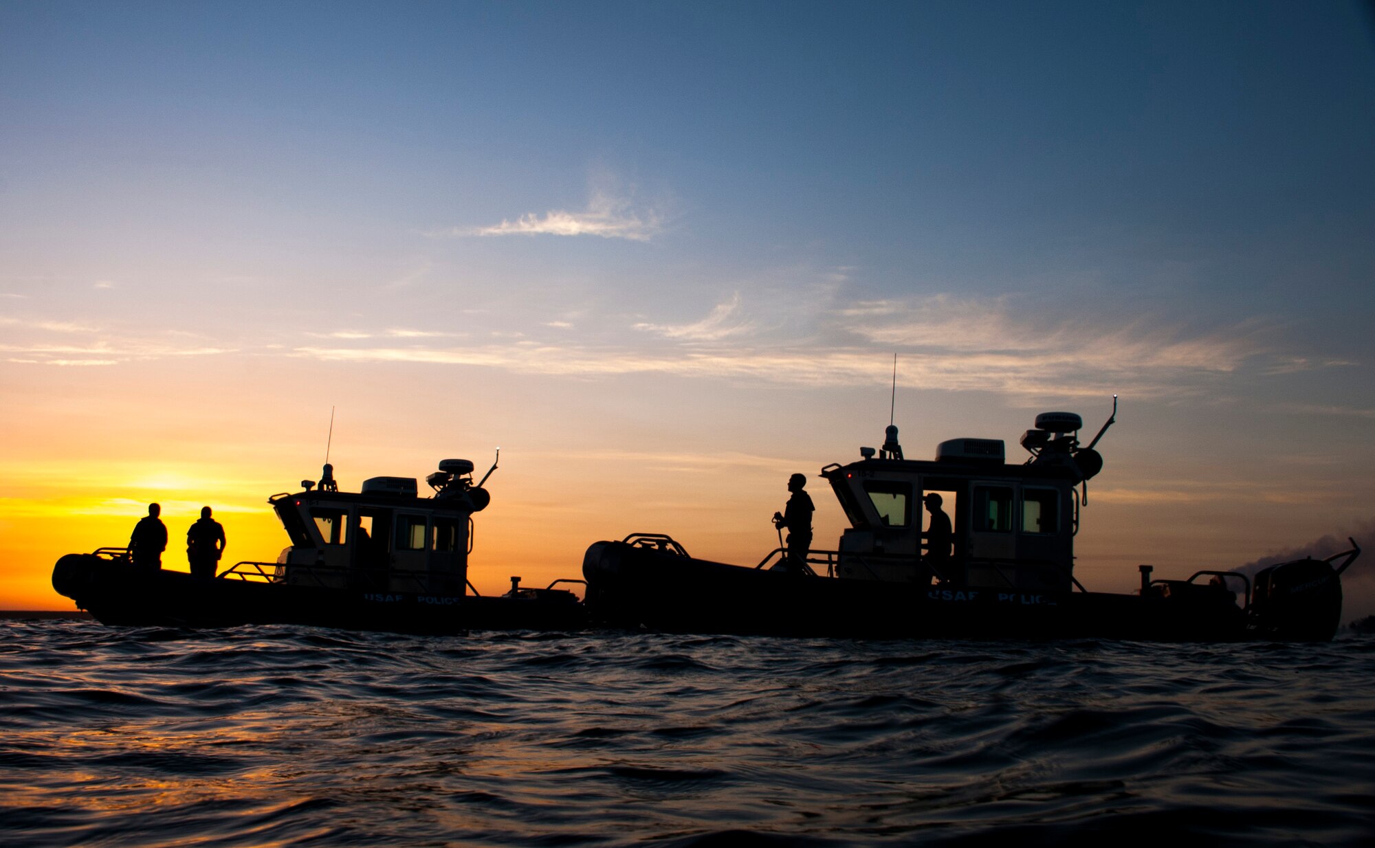 Four Marine Patrol Airmen assigned to the 6th Security Forces Squadron patrol the 7.2 mile coastline of MacDill Air Force Base, Fla., May 4, 2018.