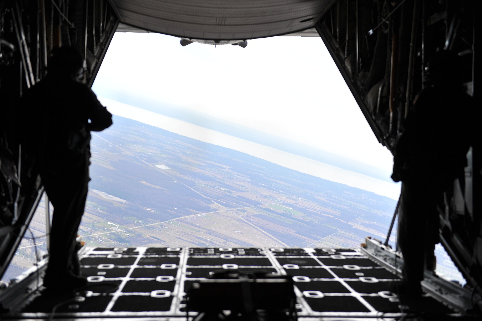 Al Armour with Willy Armour of Salem looks out the back of a C-130H Hercules during a Youngstown Air Reserve Station civic leader flight over Niagara Falls April 27, 2018.