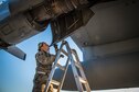 Staff Sgt. Spencer Magers inspects the intake and exhaust on the engines of a C-130H Hercules that sits on the flightline while awaiting the mission for the day at the 179th Airlift Wing, Mansfield, Ohio, April 26, 2018. (U.S. Air National Guard photo by Capt. Paul Stennett)