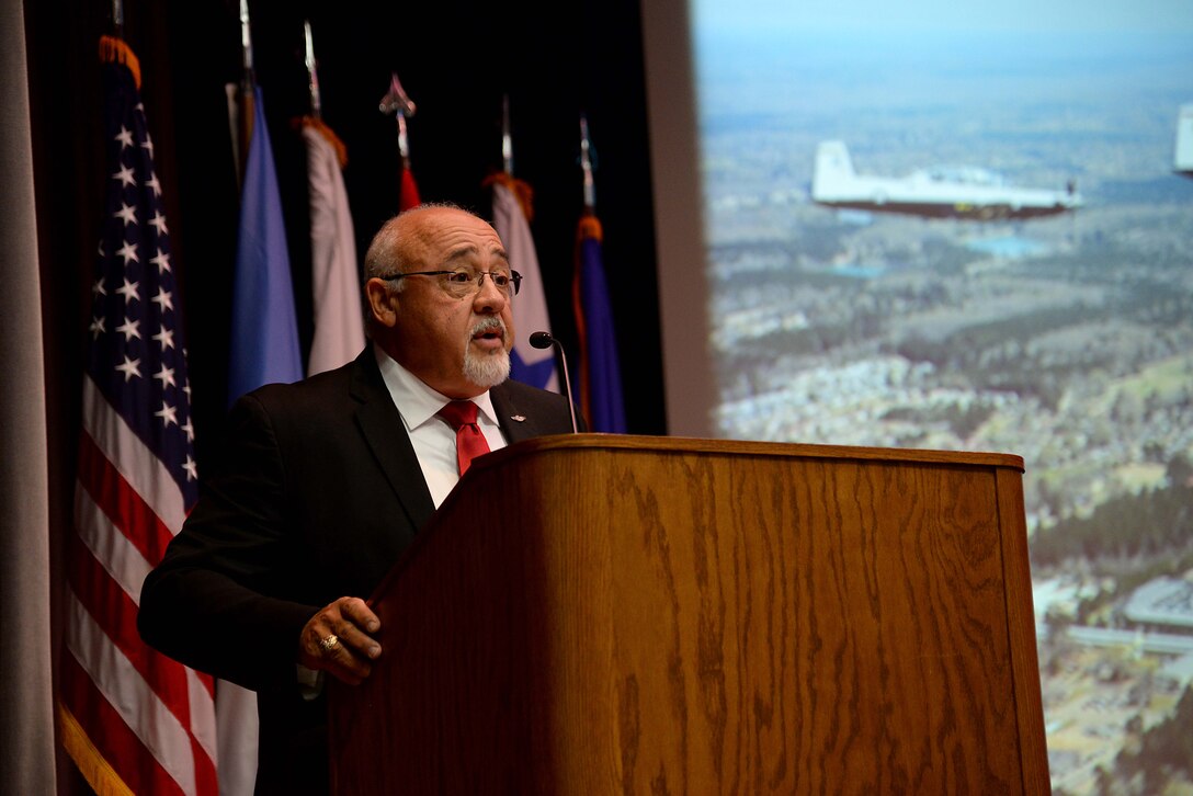 Retired Col. Cesar Rodriguez, a former F-15 Eagle pilot, speaks at the Specialized Undergraduate Pilot Training Class 18-08 graduation April 27, 2018, on Columbus Air Force Base, Mississippi. Rodriguez spoke about the importance of family, friends and teamwork for every Airmen and leader in the Air Force. (U.S. Air Force photo by Airman 1st Class Keith Holcomb)