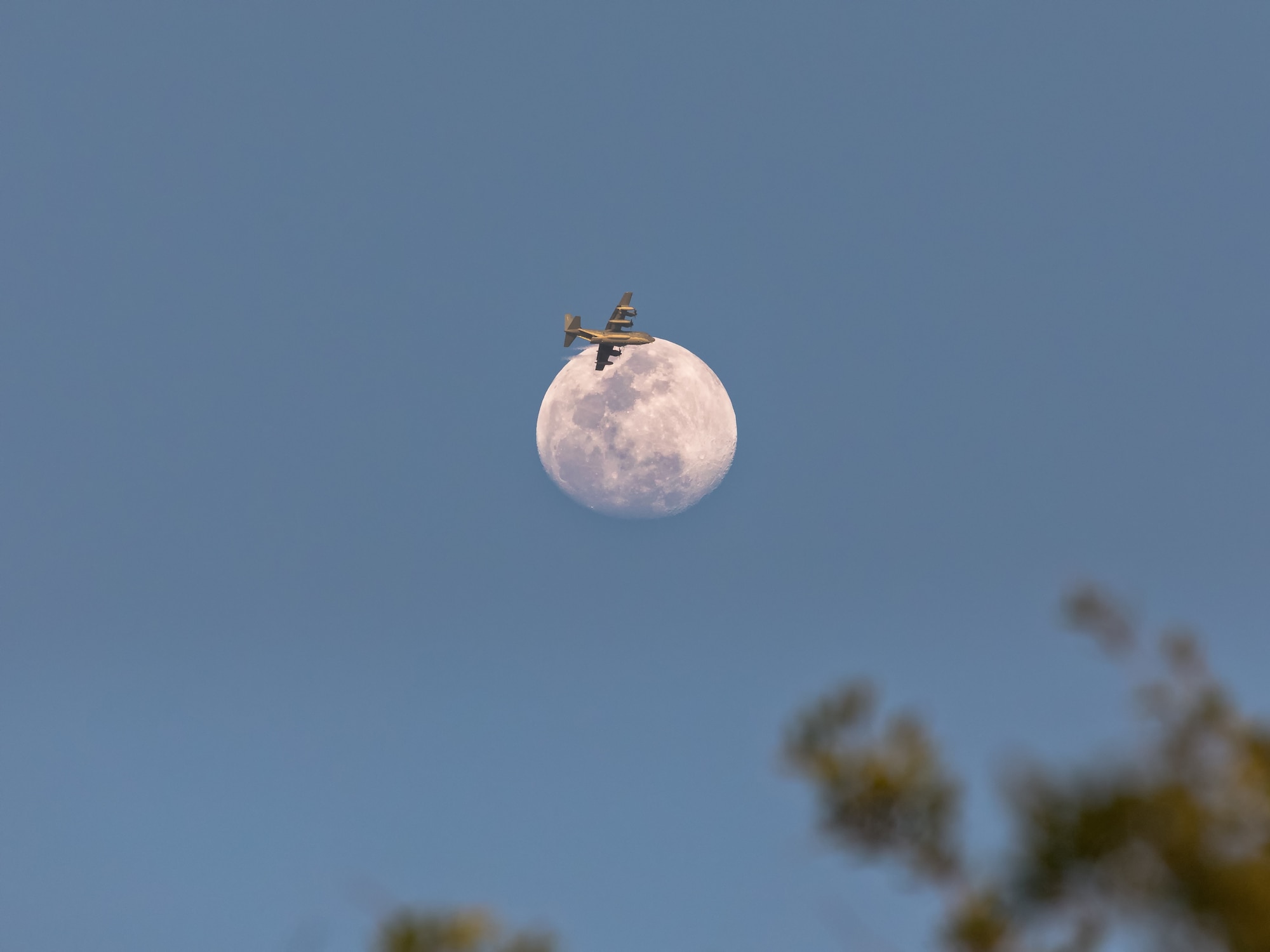 Melbourne, Florida photographer Michael Seeley spends a ton of time looking at the moon, but says it's the first time he happened to catch an airplane-lunar transit early in April 2018. After capturing the shot, he got in touch with the 920th Rescue Wing public affairs office to share the photo. Upon close inspection you can see the loading ramp was open while the Reserve Citizen Airmen piloting the HC-130N on a local training mission crossed the moon. (Photo courtesy Michael Seeley)