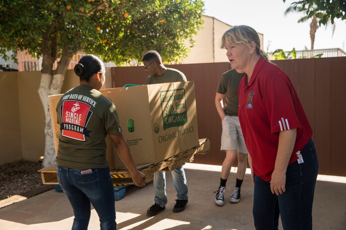 U.S. Marines stationed on Marine Corps Air Station (MCAS) Yuma, Ariz., volunteer with the Yuma Food Bank Wednesday, April 18, 2018. While volunteering for the Yuma Food Bank, the volunteers picked oranges and boxed the fruits for the food bank. Yuma Food Bank was one of the volunteer opportunities provided to Marines aboard MCAS Yuma during the "Days of Service" initiative; other opportunities included the Humane Society of Yuma, Saddles of Joy, and Old Souls Animal Farm.