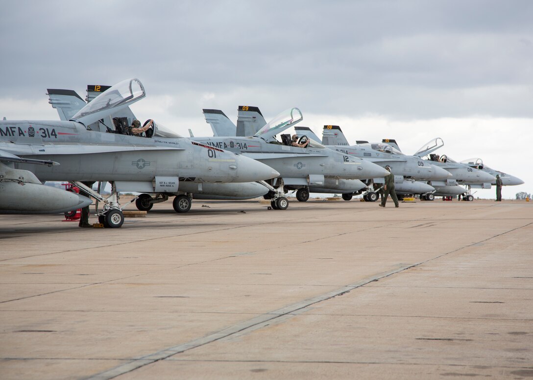 F/A-18C Hornets with Marine Fighter Attack Squadron (VMFA) 314, Marine Aircraft Group 11, 3rd Marine Air Wing, return home after a six-month deployment at Marine Corps Air Station Miramar, Calif., May 2. Marines with VMFA-314 returned home following their deployment with Special Purpose Marine Air - Ground Task Force - Crisis Response - Central Command. (U.S. Marine Corps photo by Cpl. Joshua S. McAlpine/Released)