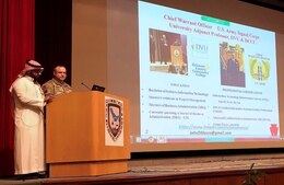Chief Warrant Officer 3 John Mosco, tactical communications chief, signal company, 28th Infantry Division, Pa. Army National Guard, delivers a cyber-security lecture with the aid of an Arabic interpreter at exercise Gulf Shield One, March 28.