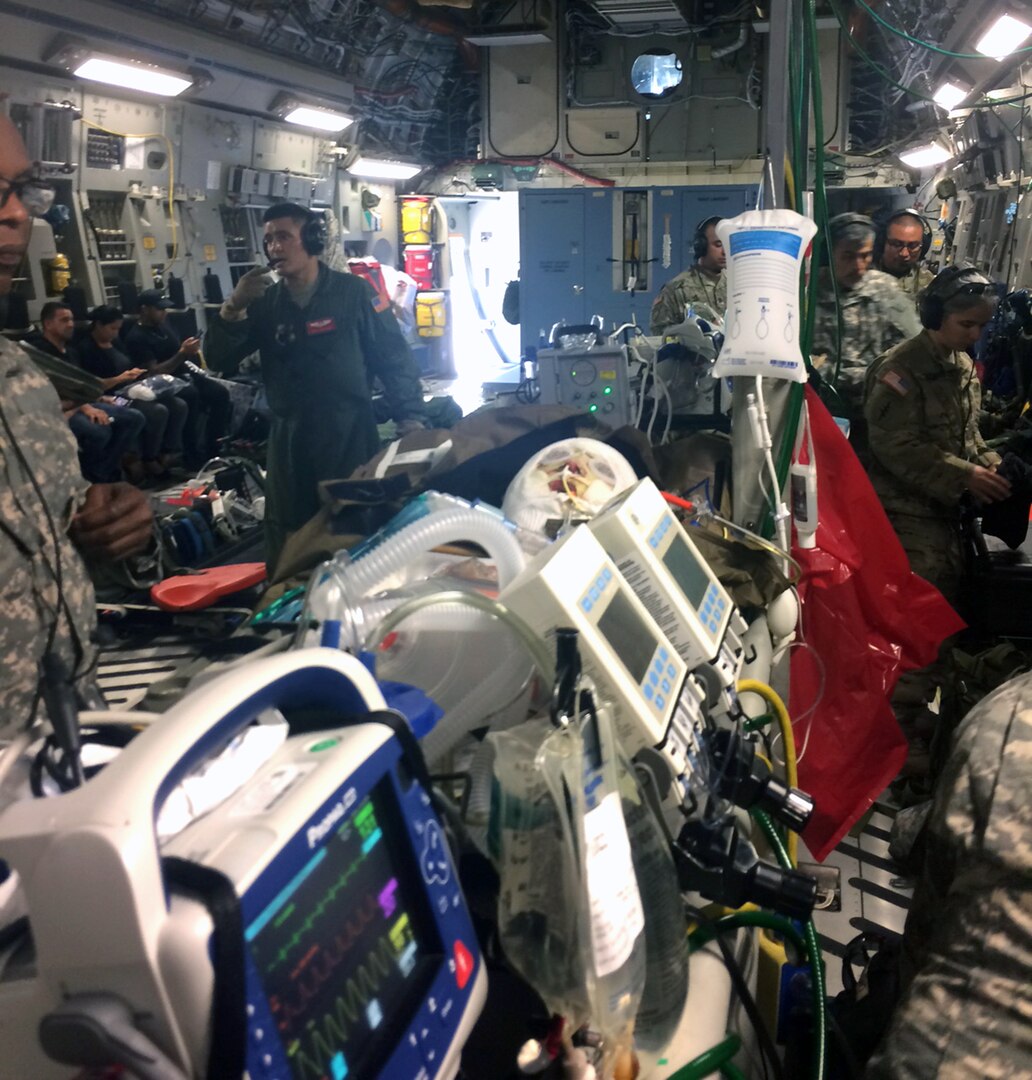 The U.S. Army Institute of Surgical Research Burn Flight Team provides care for a critical burn patient being transported in a military aircraft on a recent mission. The Burn Flight Team is a unit consisting of nurses, surgeons and respiratory therapists who have the capability to pick up and care for burn patients from anywhere in the world. The burn patients are flown in either a C-130 or C-17 aircraft configured for patient care to San Antonio, where they will continue their treatment at the U.S. Army Institute of Surgical Research Burn Center located at Joint Base San Antonio-Fort Sam Houston.