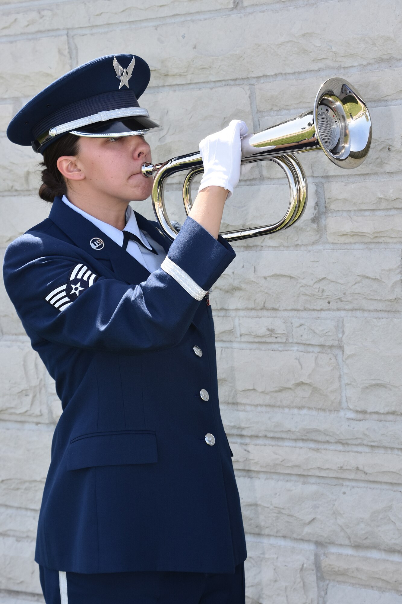 Staff Sgt. Jacquelyn Eye, a member of the Missouri Air National Guard Funeral Honors team, performs Taps for a ceremony at Jefferson Barracks National Cemetery, April 30, 2018, in honor of World War II combat aviator and former 131st Tactical Fighter Wing commander, Brig. Gen. Harding Zumwalt.  (U.S. Air National Guard photo by Senior Master Sgt. Mary-Dale Amison)