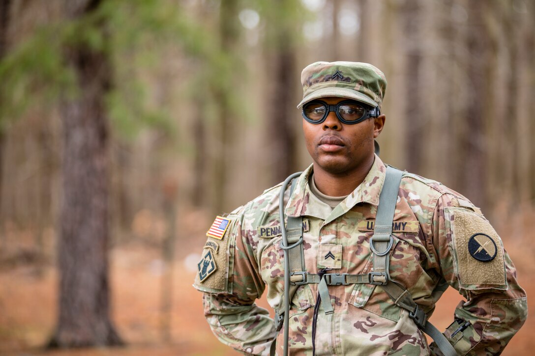 Cpl. Homer Pennington, a Soldier with 1st Information Operations Command, Fort Belvoir, Virginia, poses for a portrait after completing a land navigation course. U.S. Army Reserve Soldiers from across the United States compete in the 335th Signal Command (Theater) Best Warrior Competition held at Fort Meade, Maryland, April 16-21, 2018.