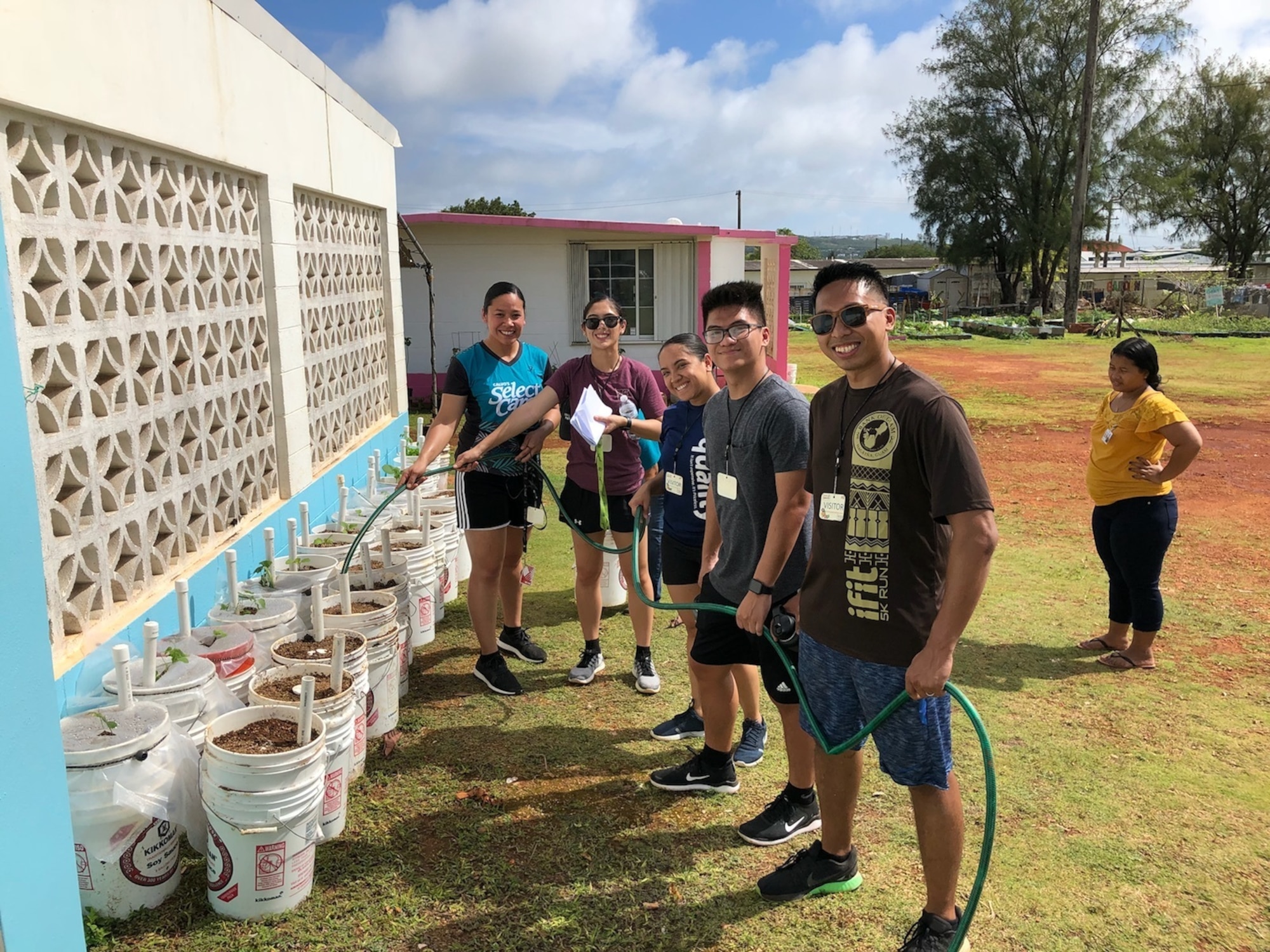 Members of the Air Force Reserve’s 624th Regional Support Group’s Development and Training Flight volunteered April 18, 2018, in Dededo, Guam, for a non-profit organization Island Girl Power where they planted vegetables during their unit training assembly, which included from left to right: Trainees Majuni Obillo, Sherwin Nucum, Charese Santos, Breanna Aguon and Latoya Ibanez. The D&TF is a program designed to prepare new enlistees physically and mentally for basic training. (Courtesy photo)