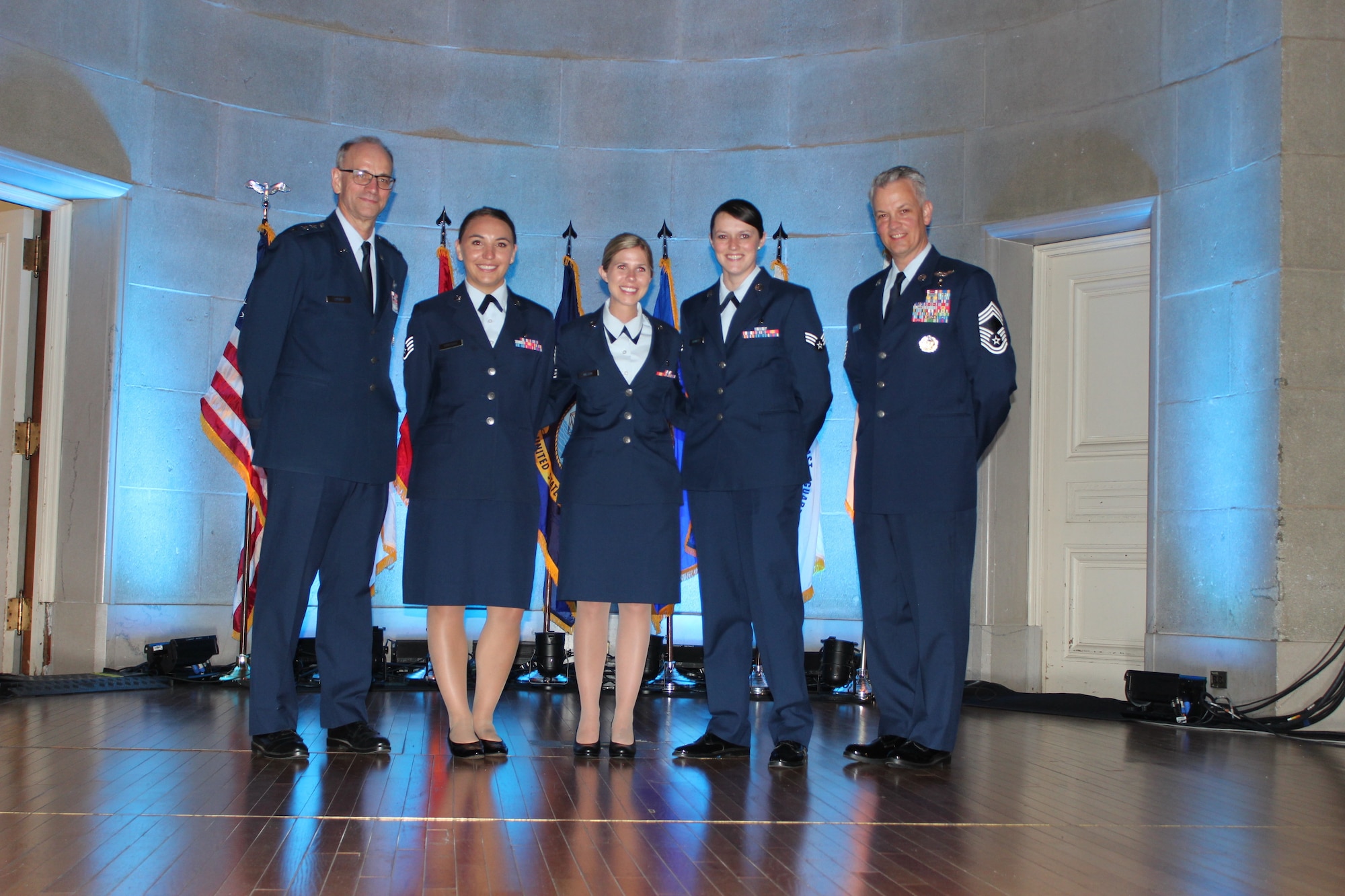 (From left) Lt. Gen. Mark Ediger, U.S. Air Force Surgeon General, Staff Sgt. Alyson Venegas, Senior Airman Linda Wilson, and Senior Airman Logan Bennett, 99th Medical Group Aerospace Medical Technicians, and Chief Master Sgt. George Cum, chief, Medical Enlisted Force, Office of the Air Force Surgeon General, at the 2018 Heroes of Military Medicine Awards in Washington, D.C., May 3, 2018. The three Airmen from the 99th were honored for the their response to the deadly 2017 mass shooting in Las Vegas, when they heroically risked their lives to save fellow concert attendees. (U.S. Air Force photo by Karina Luis)