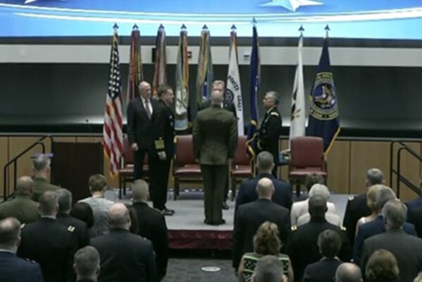 Deputy Defense Secretary Patrick M. Shanahan leads a ceremony in which Army Lt. Gen. Paul M. Nakasone takes command of U.S. Cyber Command from Navy Adm. Michael S. Rogers at Fort Meade, Md., May 4, 2018.