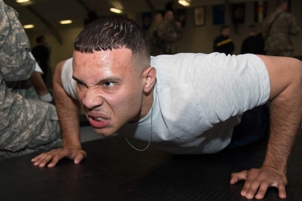 Senior Airman David Montanez Jr., 104th Security Forces Squadron specialist, demonstrates strength, resiliency and his defender skills, as he pushes through the Massachusetts Best Warrior Competition, at Joint Base Cape Cod, Mass. (Courtesy photo)