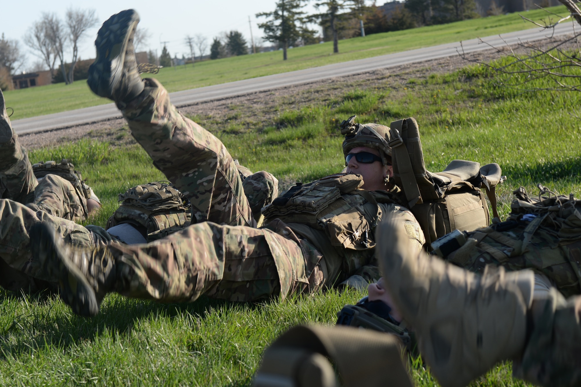 Staff Sgt. Andrew Nichols, a 28th Civil Engineer Explosive Ordnance Disposal team member, performs butterflies during the 50th Anniversary EOD Memorial Day ruck march at Ellsworth Air Force Base, S.D., May 4, 2018. National EOD Memorial Day is designated by Congress as the first Saturday of May in honor of EOD technicians who lost their lives while conducting operations across the globe. (U.S. Air Force photo by Airman 1st Class Nicolas Z. Erwin)