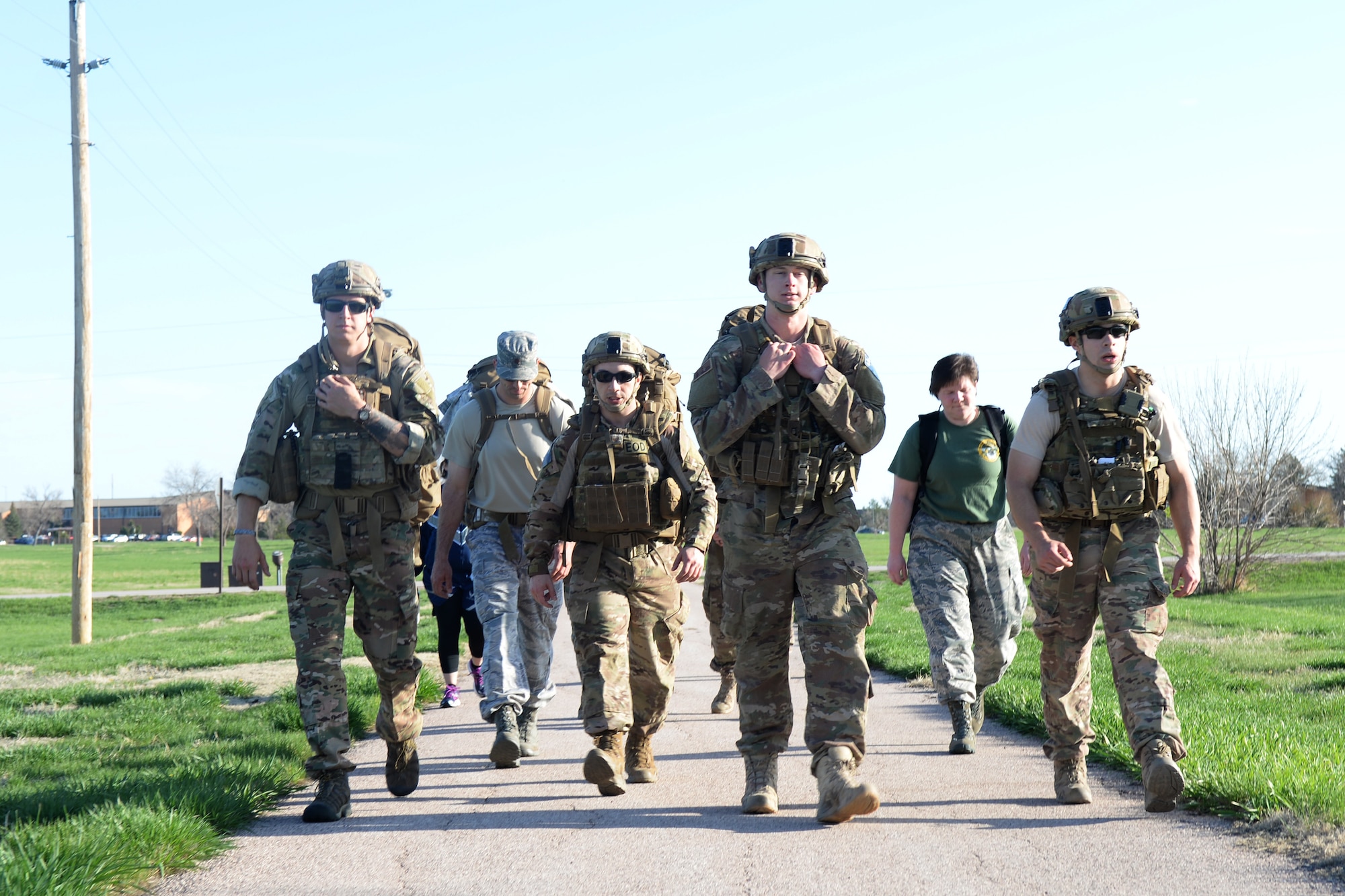Members of the 28th Civil Engineer Squadron Explosive Ordnance Disposal Flight participate in the 50th Anniversary EOD Memorial Day ruck march at Ellsworth Air Force Base, S.D., May 4, 2018. National EOD Memorial Day is designated by Congress as the first Saturday of May to honor of EOD technicians who lost their lives while conducting operations across the globe. (U.S. Air Force photo by Airman 1st Class Nicolas Z. Erwin)