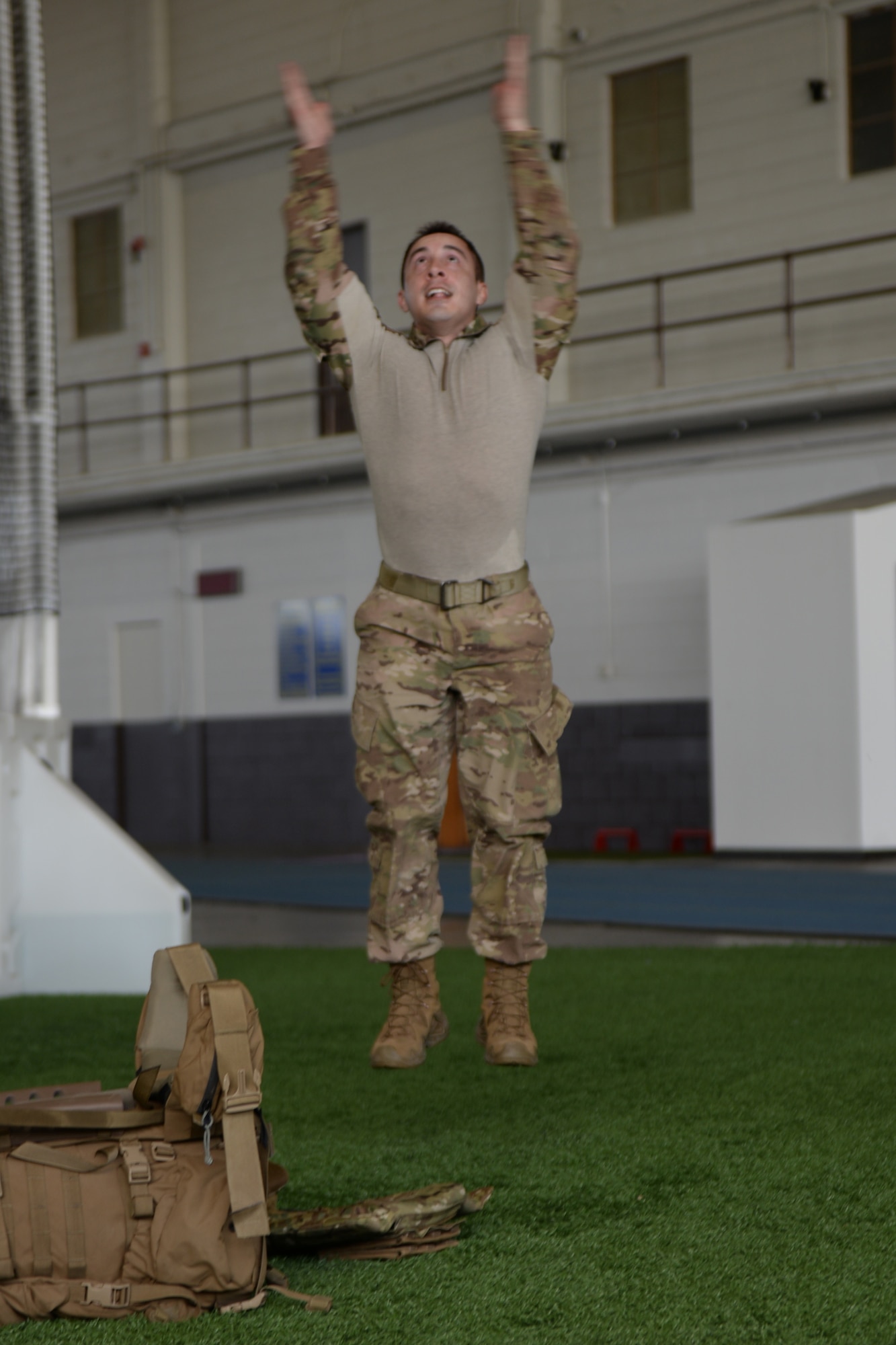 Master Sgt. Carlos Sanchez, 28th Civil Engineer Explosive Ordnance Disposal flight lead, performs one of 32 burpees during the 50th Anniversary EOD Memorial Day ruck march at Ellsworth Air Force Base, S.D., May 4, 2018. The 32 repetitions of the exercises represent the 32 fallen EOD Airmen who have been killed in the line of duty since 9/11.  (U.S. Air Force photo by Airman 1st Class Nicolas Z. Erwin)