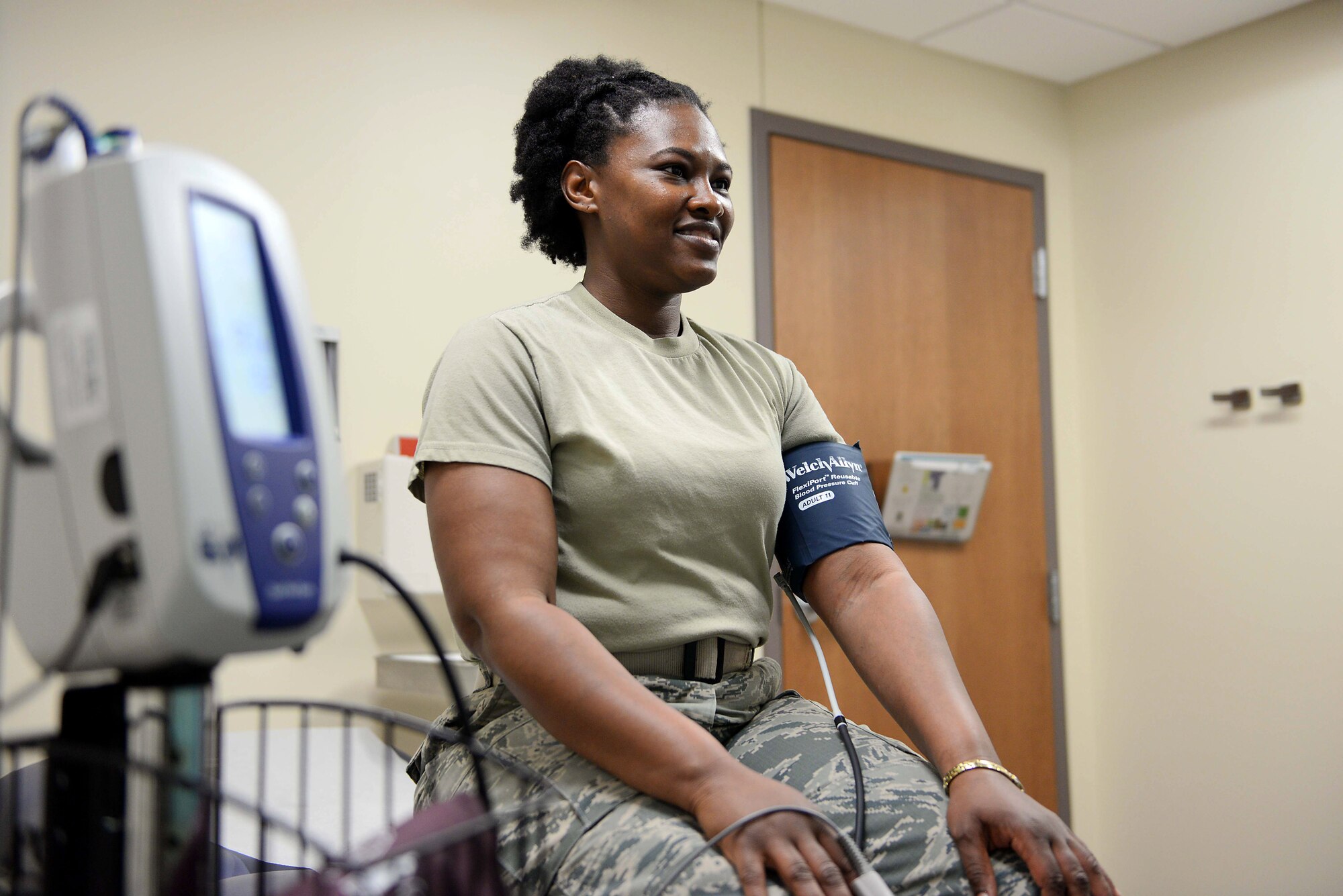 U.S. Air Force Master Sgt. Latoria Mathis, 14th Medical Group noncommissioned officer in-charge of the immunization clinic, has her vitals checked at Columbus Air Force Base, Miss., May 1, 2018. The 14th Medical Group’s goal is to keep every pilot, every Airman, and every family member healthy and ready for life’s challenges. (U.S. Air Force photo by Airman 1st Class Keith Holcomb)