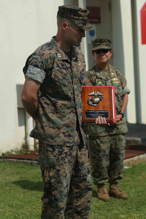 Lt. Nicholas Crossland, a dental officer with Combat Logistics Battalion 31, 31st Marine Expeditionary Unit, speaks to his Sailors and peers after receiving the Lt. J.G. Weedon E. Osbourne Memorial Award May 5, 2018 on Camp Foster, Okinawa, Japan. Crossland earned the award for work he did while deployed with the 31st MEU. The Osborne award is given to dental officers who exhibit superior leadership while serving with the field medical service. (U.S. Marine Corps photo by Lance Cpl. Jamin M. Powell)