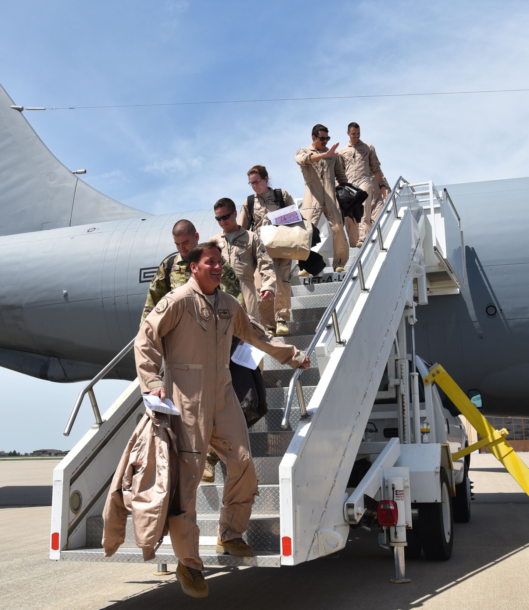 Reserve Citizen Airmen from the 18th Air Refueling Squadron and the 924th Air Refueling Squadron step off a KC-135 Stratotanker, May 6, 2018, McConnell Air Force Base, Kan