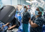 Surgical staff assigned to Military Sealift Command hospital ship USNS Mercy (T-AH 19) for Pacific Partnership 2018 (PP18) and the Sri Lankan surgical team from Base Hospital Mutur perform the first robot-assisted surgery on a patient while aboard the Mercy using the Da Vinci XI Robot Surgical System. PP18's mission is to work collectively with host and partner nations to enhance regional interoperability and disaster response capabilities, increase stability and security in the region, and foster new and enduring friendships across the Indo-Pacific Region. Pacific Partnership, now in its 13th iteration, is the largest annual multinational humanitarian assistance and disaster relief preparedness mission conducted in the Indo-Pacific.