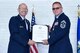 Chief Master Sgt. Christopher Barnby, 403rd Wing command chief, poses with his certificate of retirement presented to him by retired Col. Michael Manion, former 403rd Wing commander and vice commander, at the chief’s retirement ceremony held at Keesler Air Force Base, Mississippi, May 6, 2018. Barnby retired after a total of 30 years of service in the military. (U.S. Air Force photo by Tech. Sgt. Ryan Labadens)