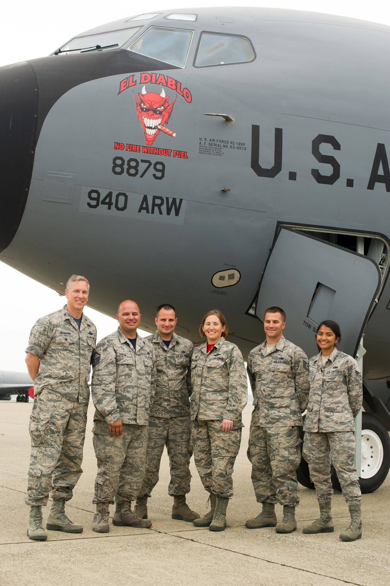 The maintenance crew of the “El Diablo” KC-135 Stratotanker stand with the 940th Air Refueling Wing commander and vice commander on the flightline after revealing the aircraft’s nose art May 5 at Beale Air Force Base, California.