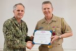 YOKOSUKA, Japan (May 2, 2018) Commander, U.S. Seventh Fleet Vice Adm. Phil Sawyer presents Capt. Jeffrey Griffin, the departing 7th Fleet chief of staff, with a Legion of Merit Medal after 32 years of service in the U.S. Navy May 2.