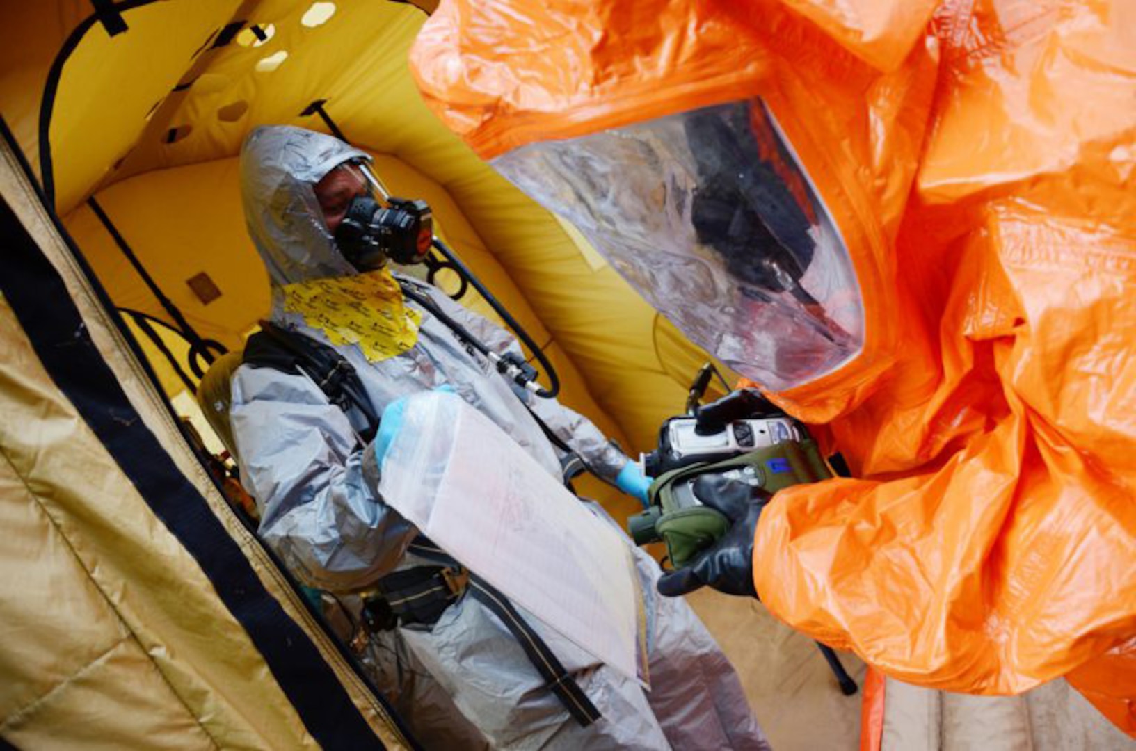 The Virginia National Guard’s 34th Civil Support Team participates in a training exercise with the Virginia State Police, the FBI and local law enforcement Oct. 24, 2017, near Richmond, Virginia. The 34th CST provided reconnaissance, decontamination, incident command and sampling support for the exercise. The event aimed to increase interagency coordination and integration. (U.S. Army National Guard photo by Sgt. 1st Class Terra C. Gatti)