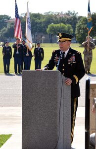 Lt. Gen. Jeffrey Buchanan, commander, U.S. Army North (Fifth Army) speaks to the large crowd gathered for the Joint Forces Retreat ceremony at MacArthur Parade Field at Joint Base San Antonio-Fort Sam Houston May 6.