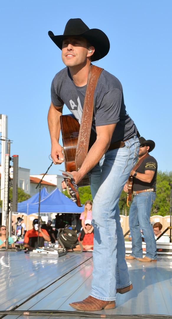 Country music star Aaron Watson entertains the crowd May 6 at Joint Base San Antonio-Fort Sam Houston during the Military Appreciation Weekend celebration May 5-6. Watson kept concertgoers engaged with stories about his family, the inspiration for his songs and his music career. Thousands of residents of San Antonio and surrounding communities took advantage of the great weather to enjoy live music, rides, arts and crafts, military demonstration teams, historic tours, a polo match, live music and fireworks.