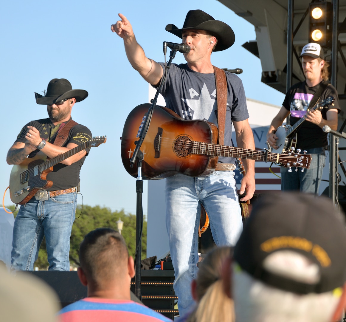 Country music star Aaron Watson entertains the crowd May 6 at Joint Base San Antonio-Fort Sam Houston during the Military Appreciation Weekend celebration May 5-6. Watson kept concertgoers engaged with stories about his family, the inspiration for his songs and his music career. Thousands of residents of San Antonio and surrounding communities took advantage of the great weather to enjoy live music, rides, arts and crafts, military demonstration teams, historic tours, a polo match, live music and fireworks.