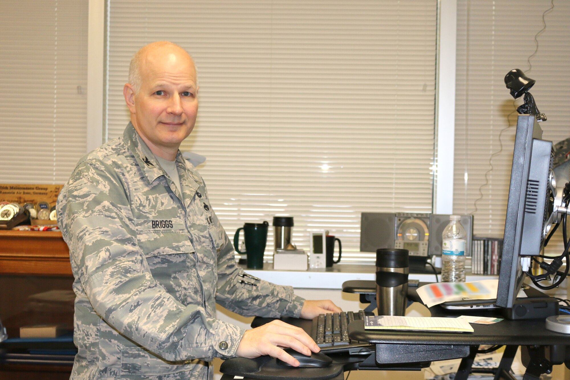Col. Raymond Briggs, chief of the Test Systems Sustainment Division at Arnold AFB, works in his office at Arnold Air Force Base. Briggs will be retiring from the Air Force and his position at Arnold. (U.S. Air Force photo/Deidre Ortiz)