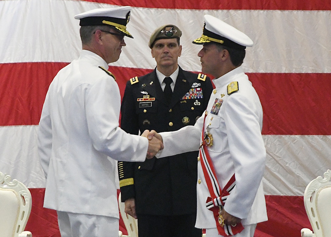 MANAMA, Bahrain (May 6, 2018) Vice Adm. Scott Stearney (left) relieves Vice Adm. John Aquilino (right) as commander, U.S. Naval Forces Central Command, U.S. 5th Fleet, Combined Maritime Forces during a change of command ceremony held aboard Naval Support Activity, Bahrain. U.S. 5th Fleet conducts maritime security operations to ensure the free flow of commerce, build and expand maritime partnerships and deter potential adversaries in one of the world's most critical maritime corridors. (U.S. Navy photo by Mass Communication Specialist 1st Class Bryan Neal Blair/Released)