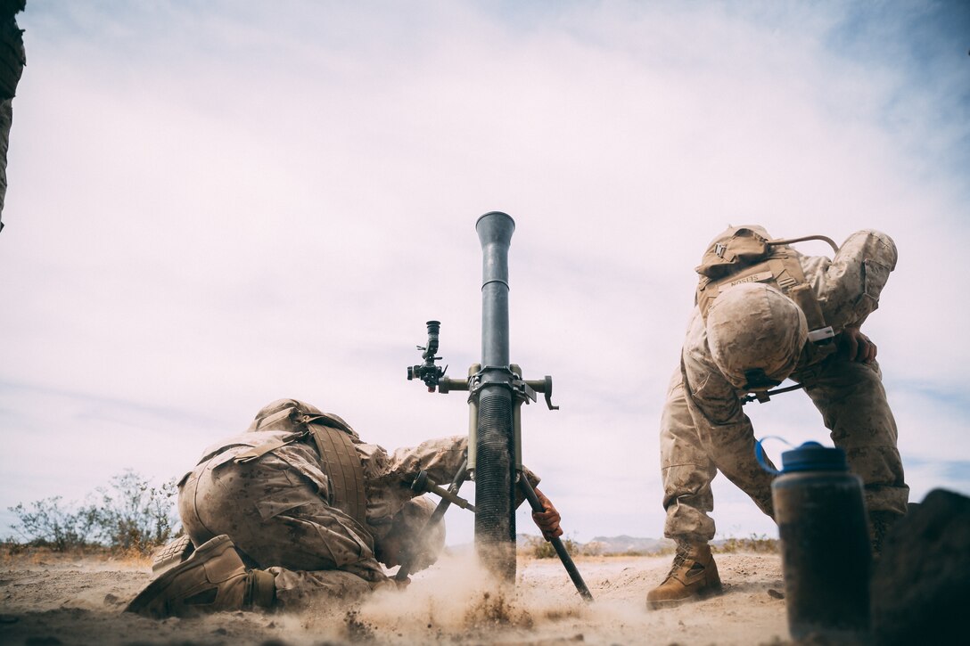 Marines with 3rd Battalion, 2nd Marine Regiment, 2nd Marine Division, fire an 81mm mortar system at Range 630 during Integrated Training Exercise 3-18 aboard the Marine Corps Air Ground Combat Center, Twentynine Palms, Calif., April 30, 2018. The purpose of ITX is to create a challenging, realistic training environment that produces combat-ready forces capable of operating as an integrated Marine Air Ground Task Force. (U.S. Marine Corps photo by Lance Cpl. William Chockey)