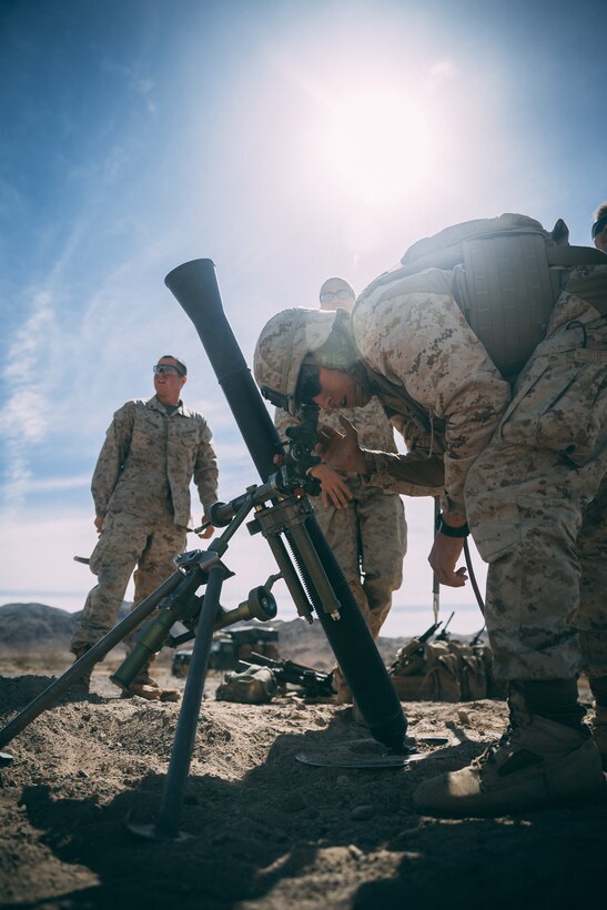 A Marine with 3rd Battalion, 2nd Marine Regiment, 2nd Marine Division, sights into a scope of an 81mm Mortar system at Range 630 during Integrated Training Exercise 3-18 aboard the Marine Corps Air Ground Combat Center, Twentynine Palms, Calif., April 30, 2018. The purpose of ITX is to create a challenging, realistic training environment that produces combat-ready forces capable of operating as an integrated Marine Air Ground Task Force. (U.S. Marine Corps photo by Lance Cpl. William Chockey)