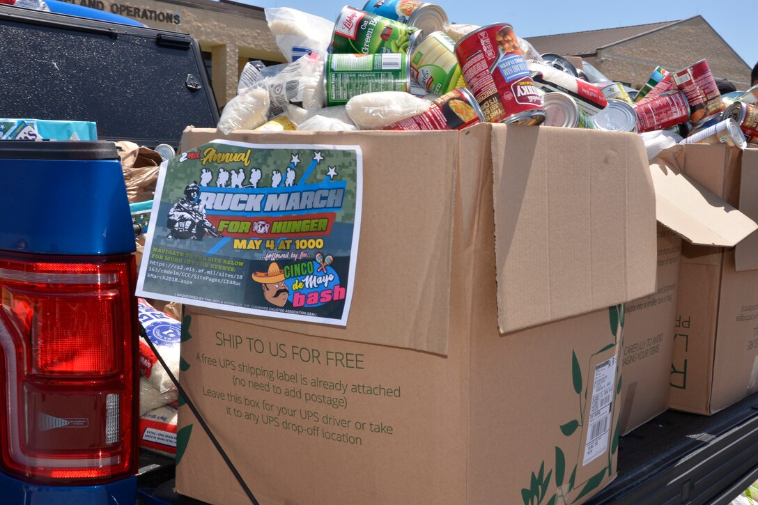 TYNDALL AIR FORCE BASE, Fla. –  Boxed donations of food goods await transport to community food pantries and agencies in Panama City following the completion of  the second annual “5K Ruck March For Hunger” May 4 here.
Military and civilian members of 1st Air Force and the 601st Air Operations Center and their family members participated in the event to raise awareness about hunger along with food donations for community food pantries and agencies in the Panama City area.  Nearly 100 people donned 30+ lb. ruck sacks, back packs or donated food to support the food drive which raised 1,911 lbs. The drive began last year when a 1st Air Force Airman saw a statistic stating that numerous students in Bay County were going to school hungry.  (Air Force photo by Mary McHale)