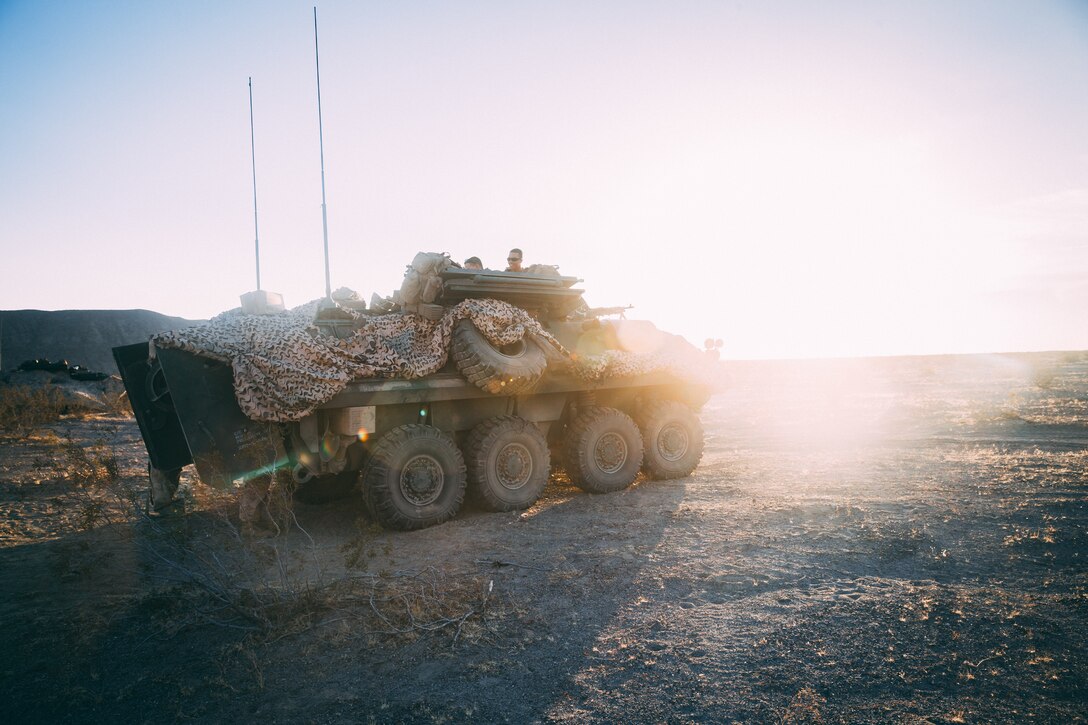 Marines with 2nd Light Armored Reconnaissance Battalion, 2nd Marine Division, stand by for a fire mission in a Light Armored Vehicle at Range 630 during Integrated Training Exercise 3-18 aboard the Marine Corps Air Ground Combat Center, Twentynine Palms, Calif., April 30, 2018. TThe purpose of ITX is to create a challenging, realistic training environment that produces combat-ready forces capable of operating as an integrated Marine Air Ground Task Force. (U.S. Marine Corps photo by Lance Cpl. William Chockey)