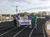 Members of 2018 Team REMEMBER display their banner while walking the track at the Relay For Life event held at Coffee County Raider Academy April 21. Pictured is Amber Wolfe, Pat Long, Rhonda Ward, Dee Wolfe and Shawn Wolfe. (Courtesy photo)