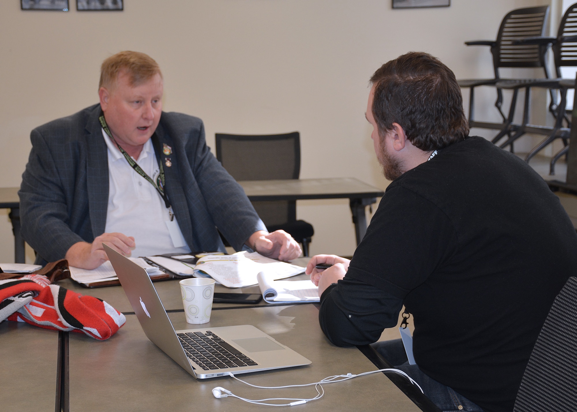 Nicholas Ripplinger (right), president of Battle Sight Technologies, meets with a technology scout from U.S. Central Command during the recent Tech Warrior OPS event. (Courtesy photo)