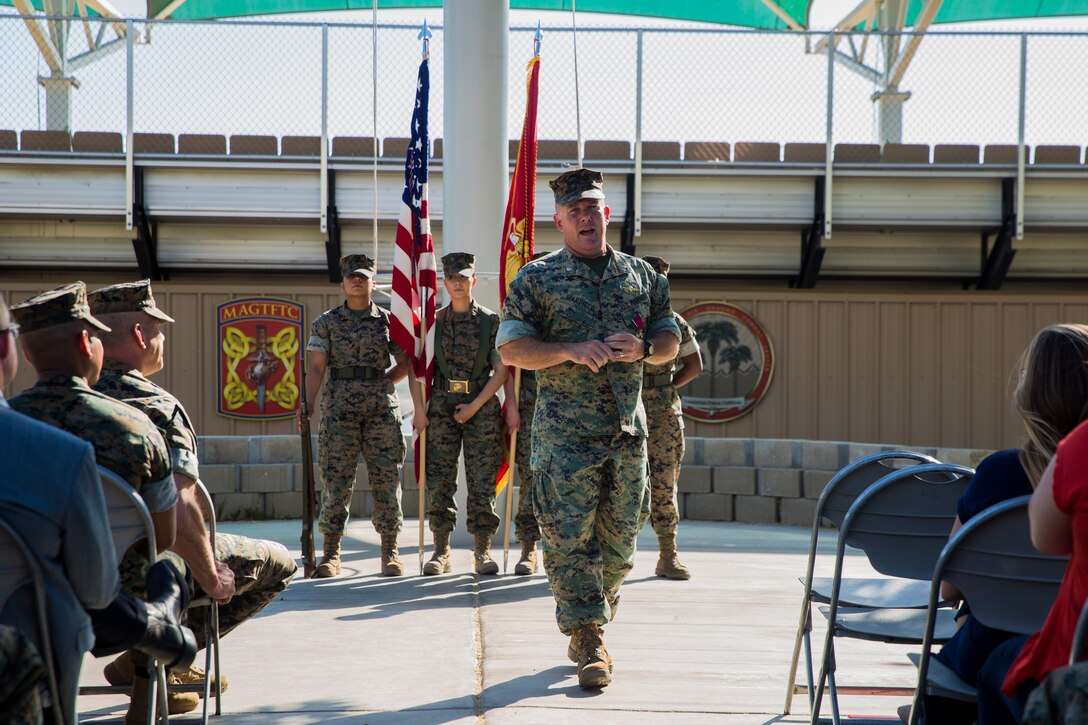 Lt. Col. Robert L. Warfield, director, Marine Corps Community Services, addresses attendees during his retirement ceremony at the flag pole aboard the Marine Corps Air Ground Combat Center, Twentynine Palms, Calif., April 27, 2018. Warfield retired after 27 years of honorable service to the Marine Corps. (U.S Marine Corps photo by Lance Cpl. Margaret Gale)