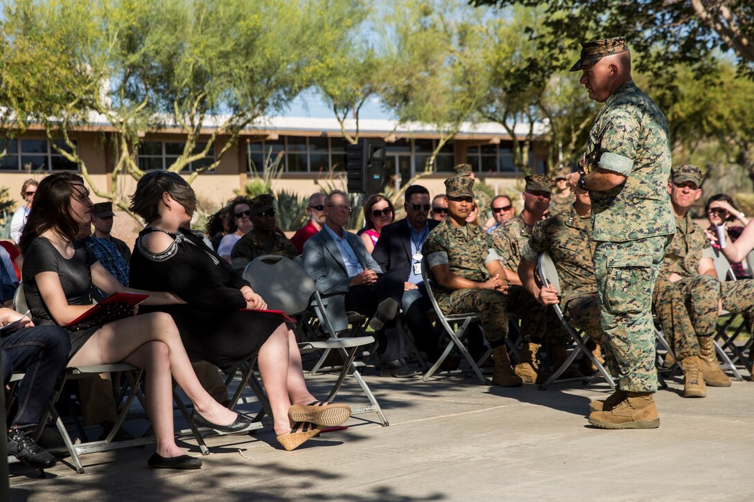 Lt. Col. Robert L. Warfield, director, Marine Corps Community Services, thanks his friends and family for the support they have given him throughout his career during his retirement ceremony at the flag pole aboard the Marine Corps Air Ground Combat Center, Twentynine Palms, Calif., April 27, 2018. Warfield retired after 27 years of honorable service to the Marine Corps. (U.S Marine Corps photo by Lance Cpl. Margaret Gale)