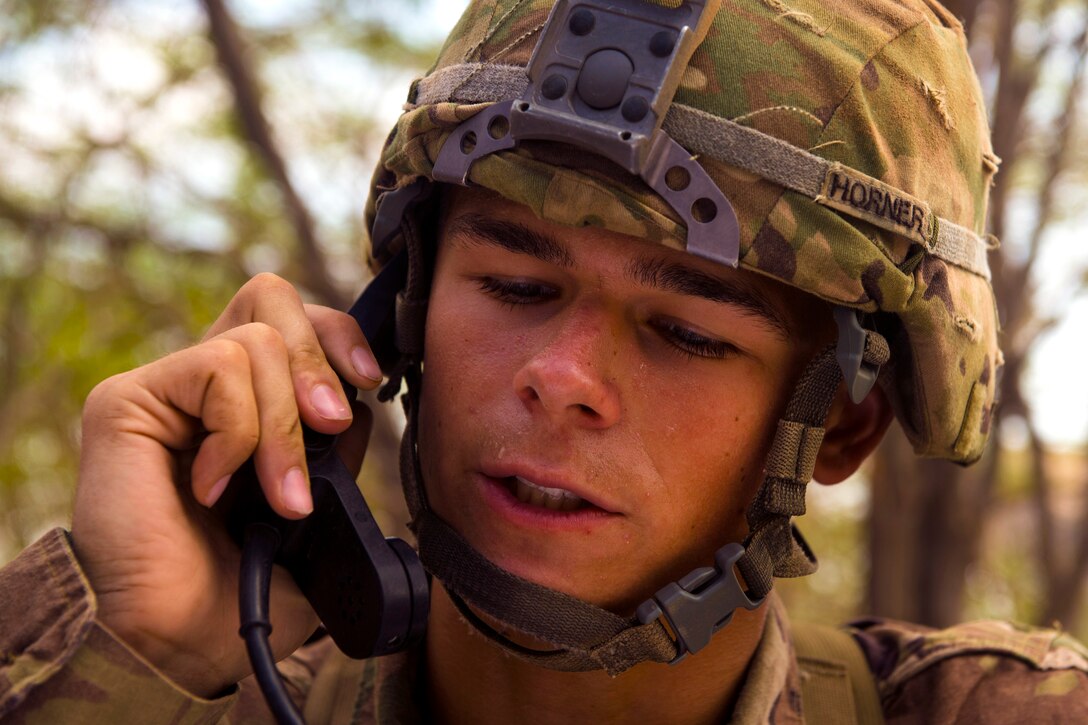 A soldier practices calling for an air extraction.
