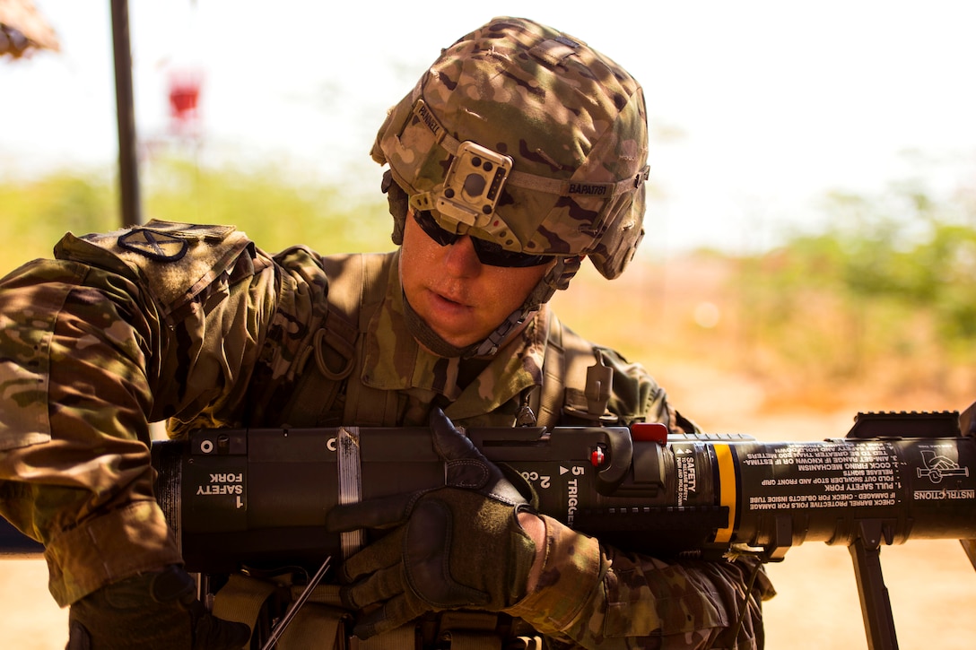 A soldier prepares an AT4 light anti-armor weapon.
