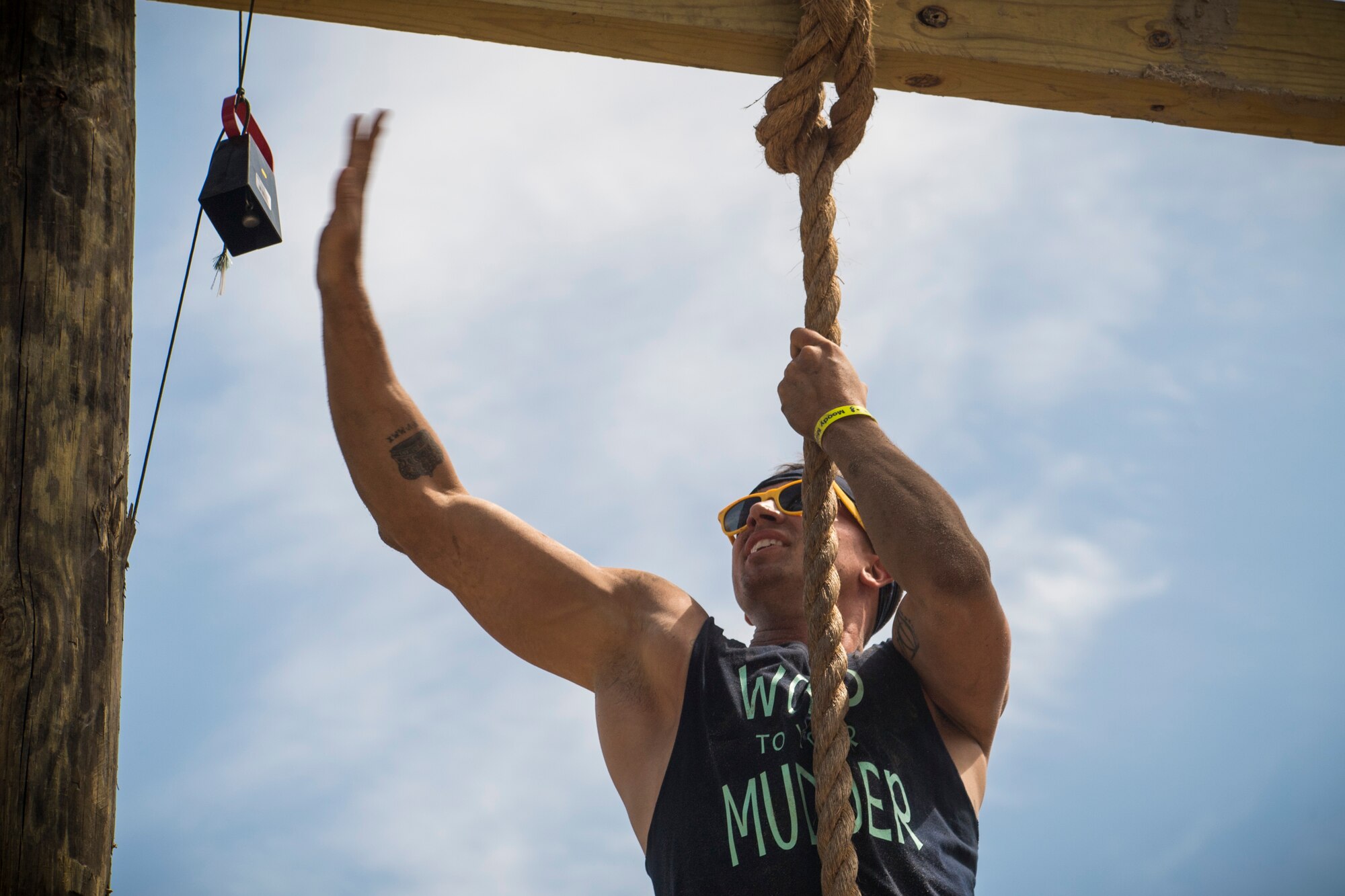 A Moody Mud Run participant completes a rope obstacle, May 5, 2018, in Ray City, Ga. Participants trekked 4.6 miles through the mud, water and 29 obstacles that made up the course. This is the fifth year Moody has hosted the event and more than 800 patrons participated. (U.S. Air Force photo by Senior Airman Janiqua P. Robinson)